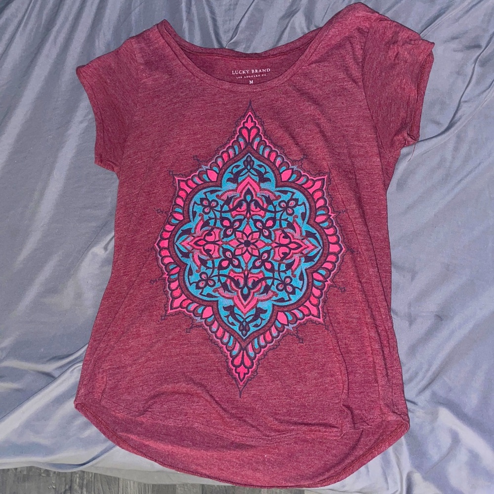 This shirt is from Lucky Brand and was brought years ago.